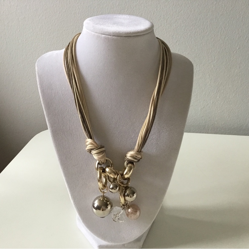 Statement necklace tan with gold tone beads. Made in Italy